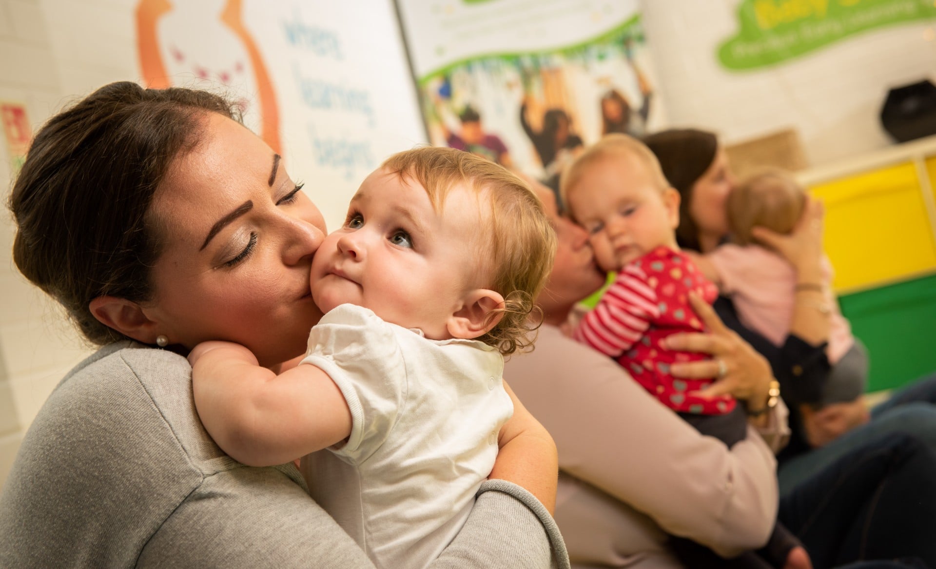 mum and baby cuddles at baby sensory class